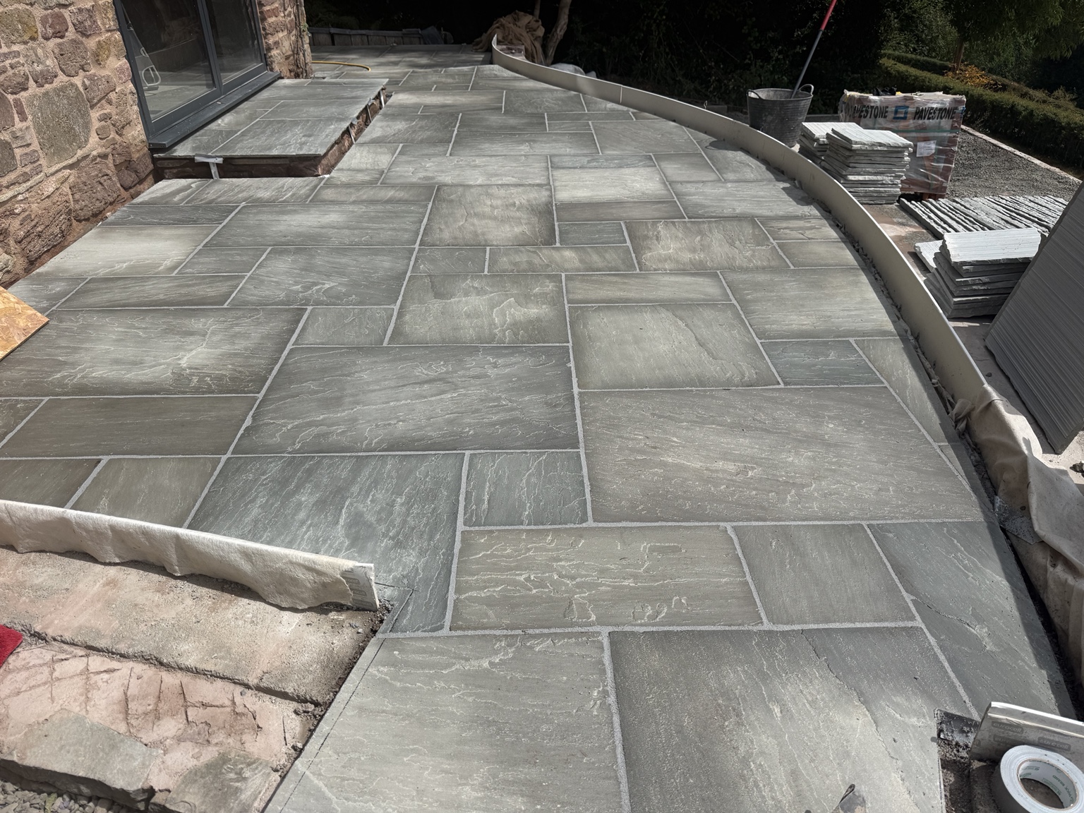 Natural stone paving by Orchard Building Services